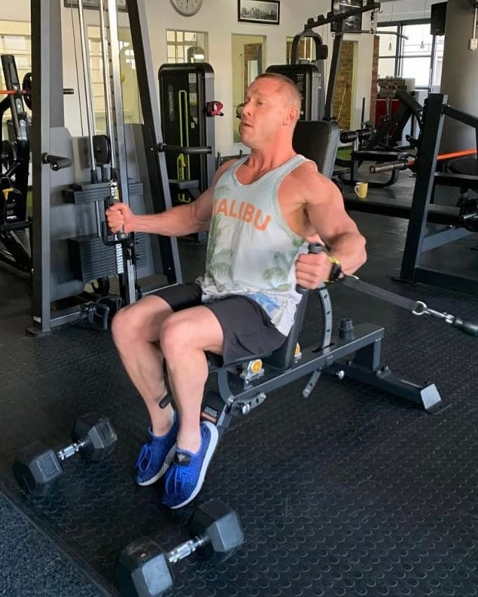 David training on a cable machine in the Boost Fitness gym